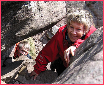 Pam and Paul descend the tricky looking (but easy) scramble from the summit - and yes there is another more exposed route for the non-vertigo department